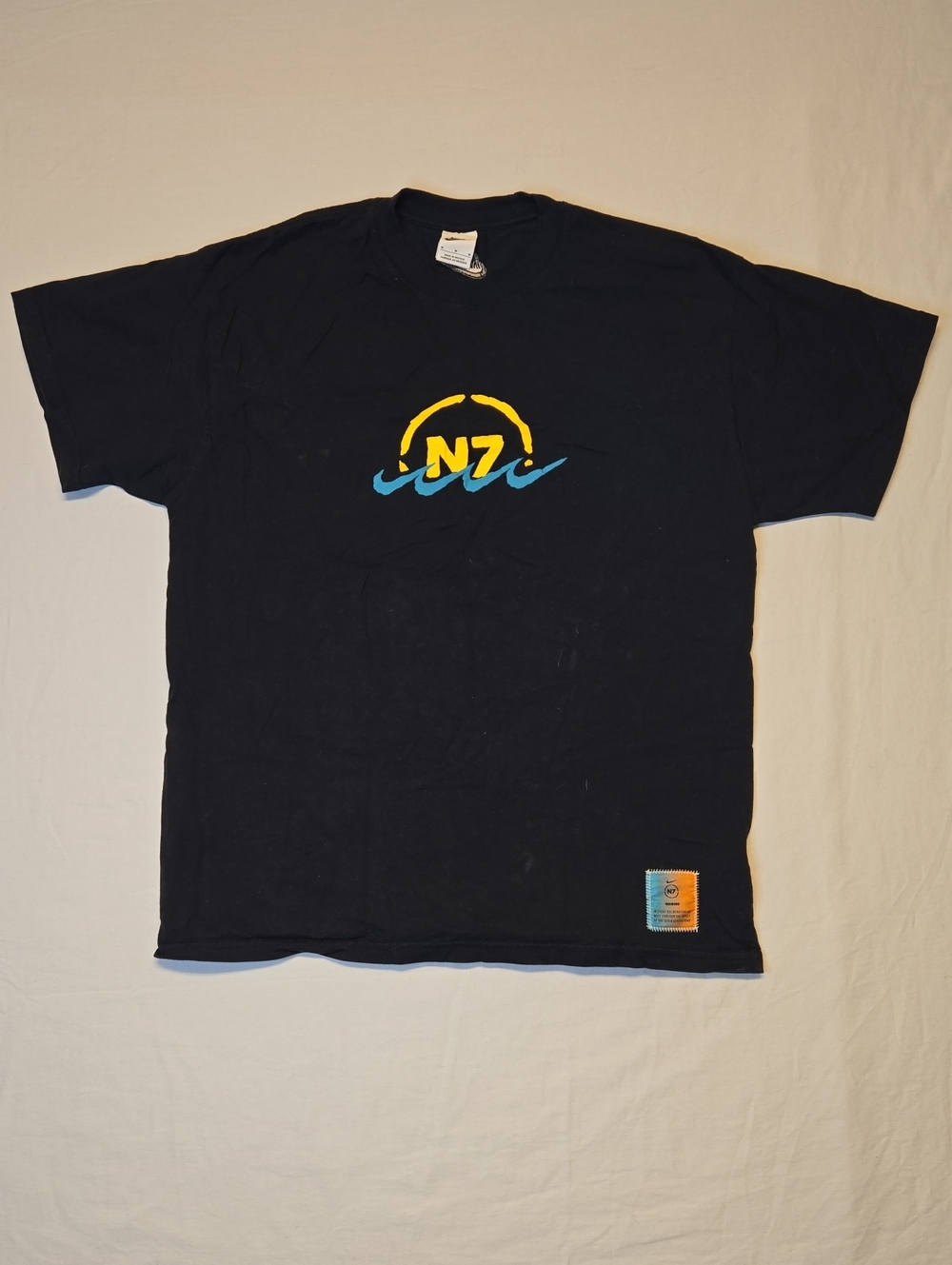 Nike Black Short Sleeve T- Shirt with Yellow and Blue N7 Wave Graphic